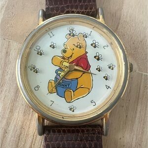 Vintage the Disney Store Winnie the Pooh rotating bees watch NEW BATTERY